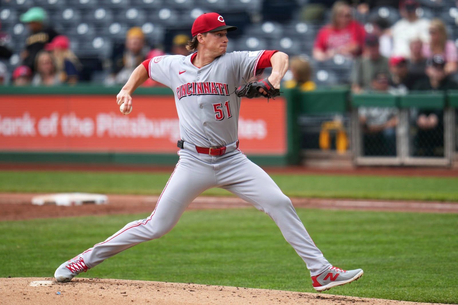 Cincinnati Reds pitcher Brady Singer delivers during the first inning of a baseball game against the Pittsburgh Pirates in Pittsburgh, Wednesday, May 21, 2025. (AP Photo/Gene J. Puskar)