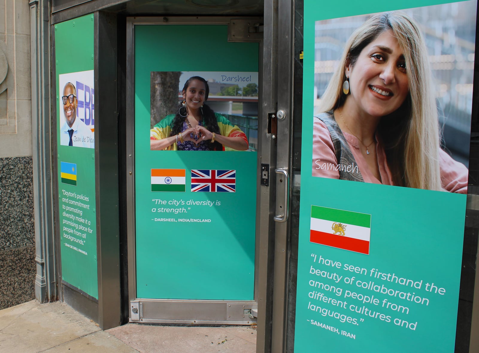 Immigrants from Iran, India, Rwanda and many other natures are included in Welcome Dayton's art display on Main Street.
