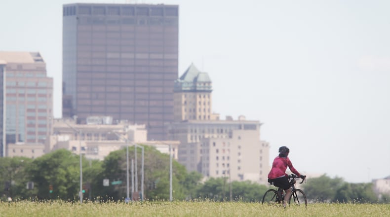 The bike path along the Great Miami River was busy Tuesday morning with cyclist. There's a shortage of bikes in the Dayton area because of a supple chain problem. JIM NOELKER/STAFF