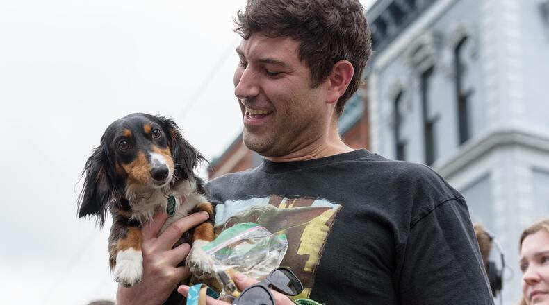 The Oregon District’s 6th annual Derby Day Running of the Wieners happened on Saturday, May 4, 2024. Hosted by The Oregon District Business Association, proceeds from the wiener dog race registration fee benefitted the Humane Society of Greater Dayton. TOM GILLIAM / CONTRIBUTING PHOTOGRAPHER