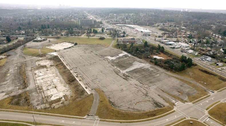 Outlines of retail building foundations and a parking lot are all that remains of the Forest Park shopping center on North Main Street in Harrison Township. County Corp, in partnership with Harrison Township and Montgomery County will facilitate the first public meeting to initiate feedback on the Forest Park Area Plan on Monday, January 29th at Horizon Science Academy. TY GREENLEES / STAFF
