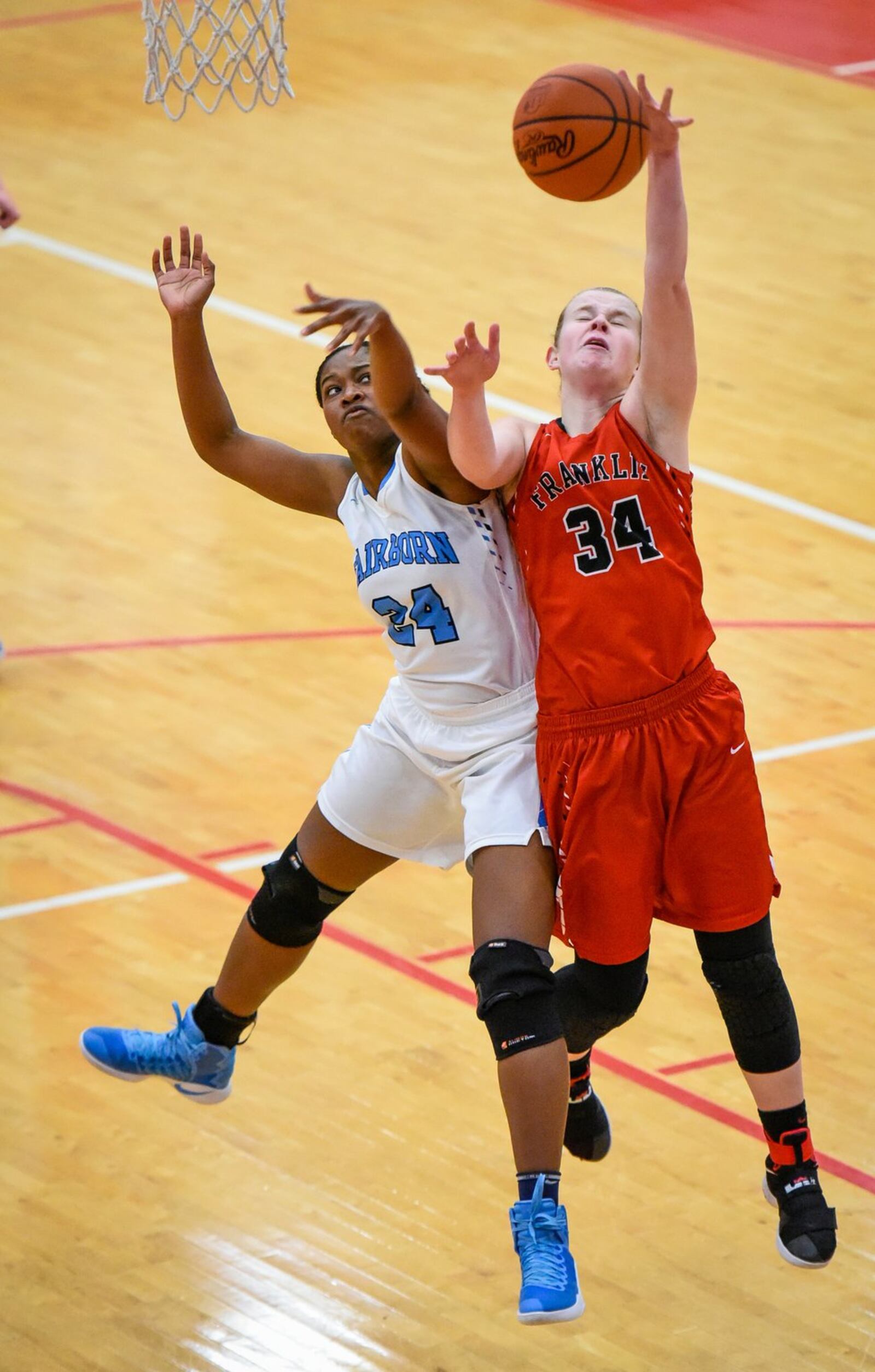 Franklin’s Brooke Stover puts up a shot while being defended by Fairborn’s Jana Brown-Griffith during their Division I sectional game Feb. 20, 2017, at Troy. NICK GRAHAM/STAFF