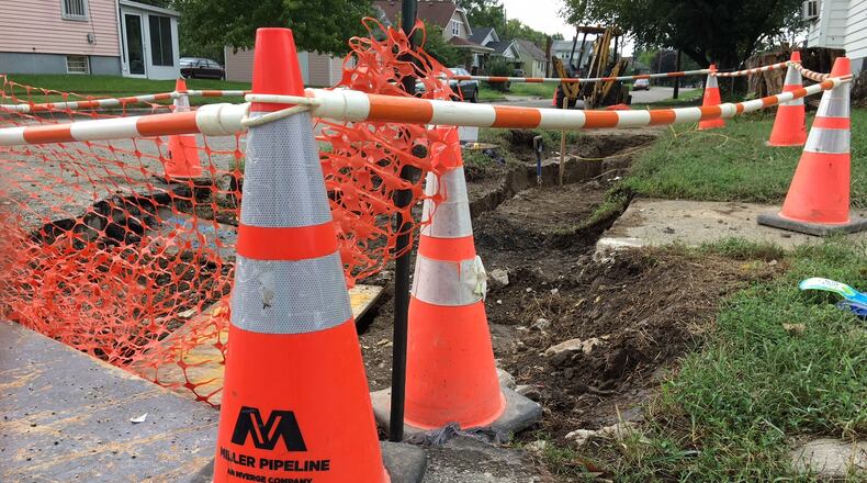 Miller Pipeline crews are working to replace aging natural gas pipelines for Vectren across Ohio. Crews placed safety cones at the corner of Kammer and Huron avenues in Dayton for a current project. Public Utilities Commission of Ohio said the state’s four major energy companies plan to replace 11,000 miles of main lines and service lines. The companies have spent $3.8 billion through 2016 and plan another $3.1 billion to complete the work. RICHARD WILSON/STAFF