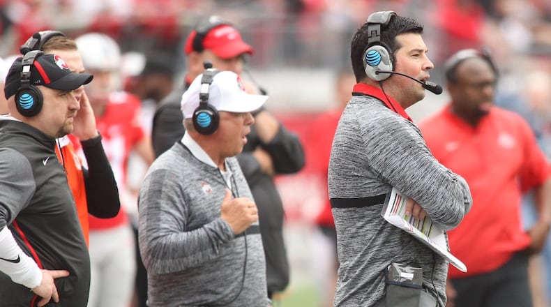 Ohio State quarterbacks coach and co-offensive coordinator Ryan Day watches the spring game on Saturday, April 14, 2018, at Ohio Stadium in Columbus. David Jablonski/Staff