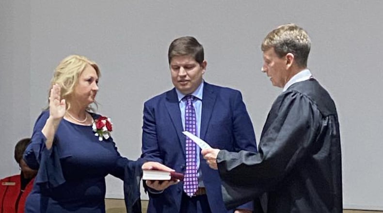 Montgomery County recorder Lori Kennedy was sworn into office on Friday at the Montgomery County administrative building. The oath of office was administered by Second District Court of Appeals Judge Christopher Epley. PHOTO COURTESY MONTGOMERY COUNTY RECORDER'S OFFICE.