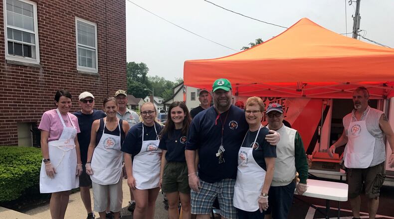 John “Sully” Sullivan at Food for the Journey Project lunch giveaway Friday at East Dayton Fellowship Church. (Photo by Tom Archdeacon)
