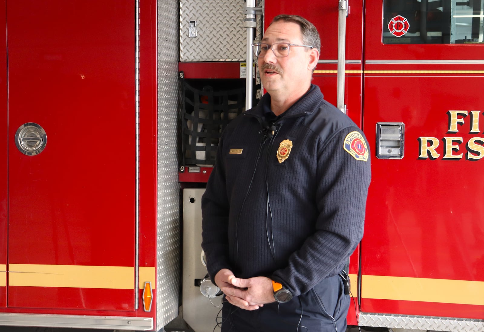 Springfield Fire Rescue Division Chief Jacob King gives an update on a Dec. 15 fire at Springfield Fire Station #6 Monday, Dec. 22, 2025. JESSICA OROZCO/STAFF