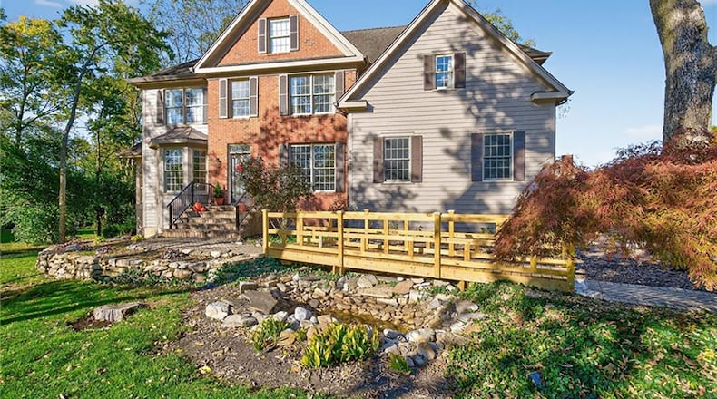 The "London Bridge" has is so named because it has a wood footbridge connecting the driveway to the front entrance. CONTRIBUTED