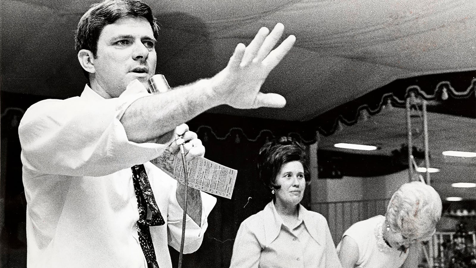 Phil Donahue at a charity auction with Erma Bombeck. Donahue and Bombeck were neighbors in Centerville. DAYTON DAILY NEWS ARCHIVE