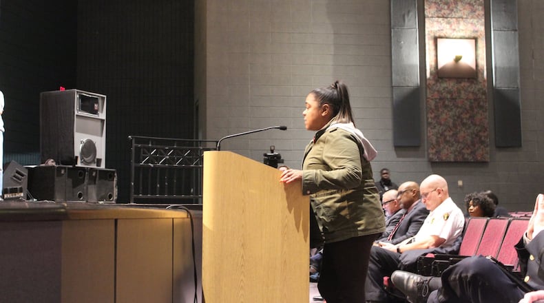 Dayton resident Kenya Baker urged the city commission at a recent meeting not to discontinue the Lot Links program. CORNELIUS FROLIK / STAFF