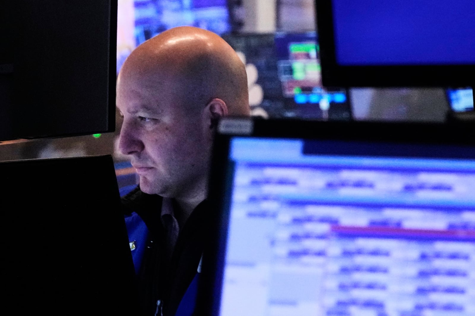 Specialist John Parisi works at his post on the floor of the New York Stock Exchange, Thursday, April 24, 2025. (AP Photo/Richard Drew)