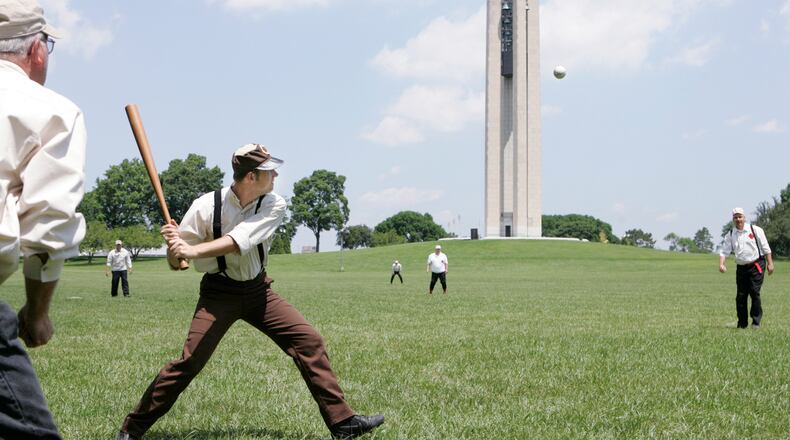 Nate “Frenchie” Buckner, playing for the Clodbusters Base Ball Club, hits a triple in the first inning as they play against the Mansfield Independents. The vintage base ball game was played at Carillon Historical Park, in Dayton.