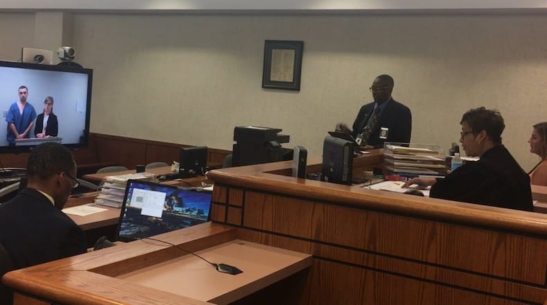 Dylan Angel appears via video conference before Dayton Municipal Court Judge Mia Wortham Spells on July 7, 2017. Angel, charged with murder in the slaying of 14-year-old Mackenna Kronenberger, had bond set at $1 million. JEREMY P. KELLEY/STAFF