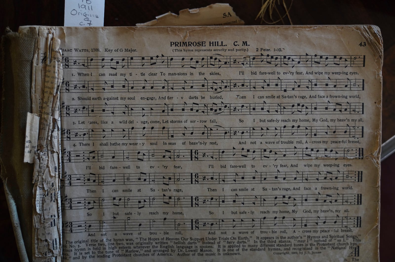 A 1911 edition of "The Sacred Harp," a shape-note hymnal from the 1800s, opened to song No. 43, "Primerose Hill," at the Sacred Harp Publishing Company and Museum in Carrollton, Ga., on Friday, March 21, 2025. (AP Photo/Jessie Wardarski)