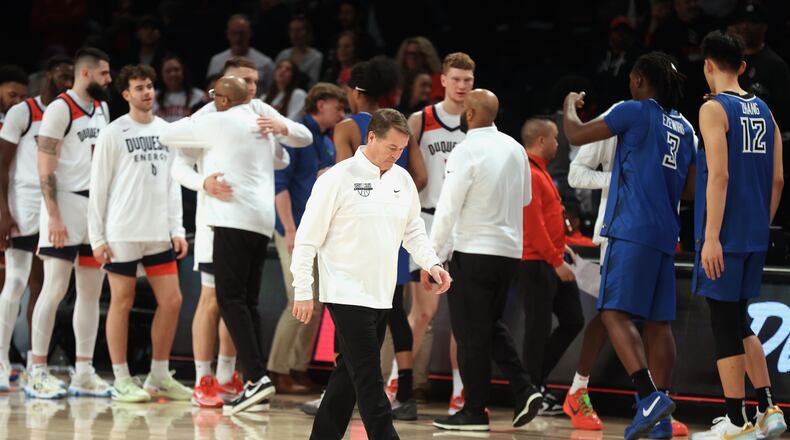 Saint Louis coach Travis Ford leaves the court after a loss to Duquesne in the second round of the Atlantic 10 Conference tournament on Wednesday, March 13, 2024, at the Barclays Center in Brooklyn, N.Y. David Jablonski/Staff