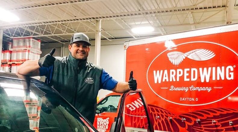 Nick Bowman, co-founder of Warped Wing Brewing Company, has been delivering beer to customers' homes, using contact-less delivery. The downtown Dayton brewery is also offering its food menu for curbside pickup and delivery.