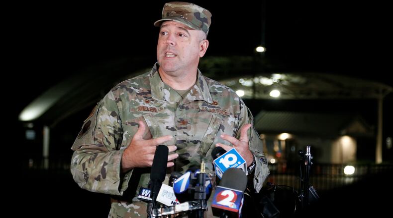 Col. Patrick MIller, 88th Air Base Wing and Installation Commander, answers questions during a Friday, Sept. 10, 2021, news conference after a lockdown at Wright-Patterson Air Force Base. The base was put on lockdown due to a report of a possible active shooter but was later given the all clear after no threat was found. (AP Photo/Jay LaPrete)