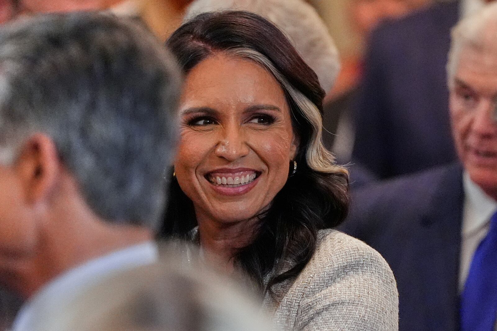 Director of National Intelligence Tulsi Gabbard arrives before President Donald Trump speaks during a reception for Republican members of Congress in the East Room of the White House, Tuesday, July 22, 2025, in Washington. (AP Photo/Julia Demaree Nikhinson)