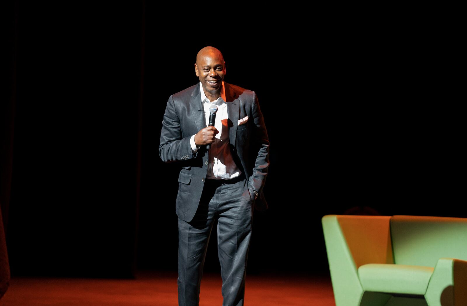 Dave Chappelle performs during a theater dedication ceremony honoring the comedian and actor, and to raise funds to support Duke Ellington School of the Arts in Washington, Monday, June. 20, 2022. He will be inducted into the 2023 Dayton Region Walk of Fame on Oct. 11 at Sinclair Community College. (AP Photo/Gemunu Amarasinghe)