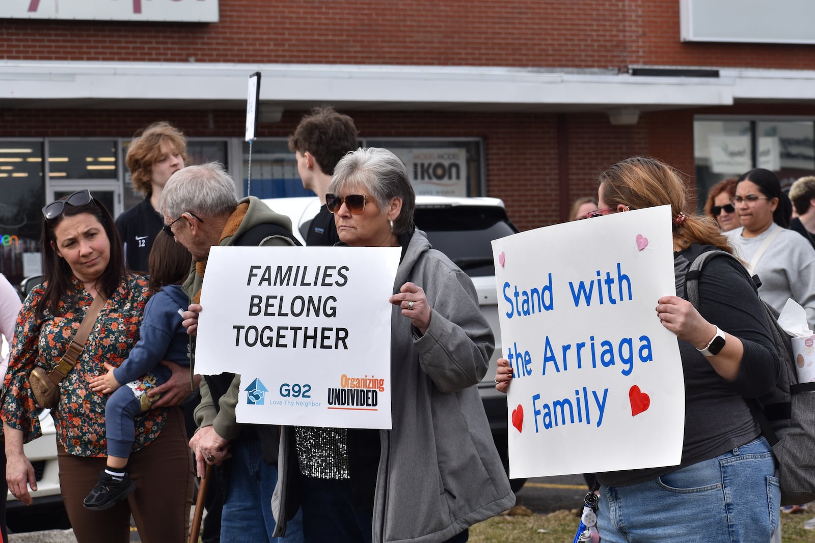 Members of the Springfield community gather Saturday, Feb. 28, 2026 outside of the Southgate shopping center in Springfield to advocate for Juan Arriaga Reyes, an immigrant from Mexico who had been living in Springfield for years, as Arriaga Reyes has been detained by Immigration and Customs Enforcement following his annual check-in with the agency. SAM WILDOW/STAFF