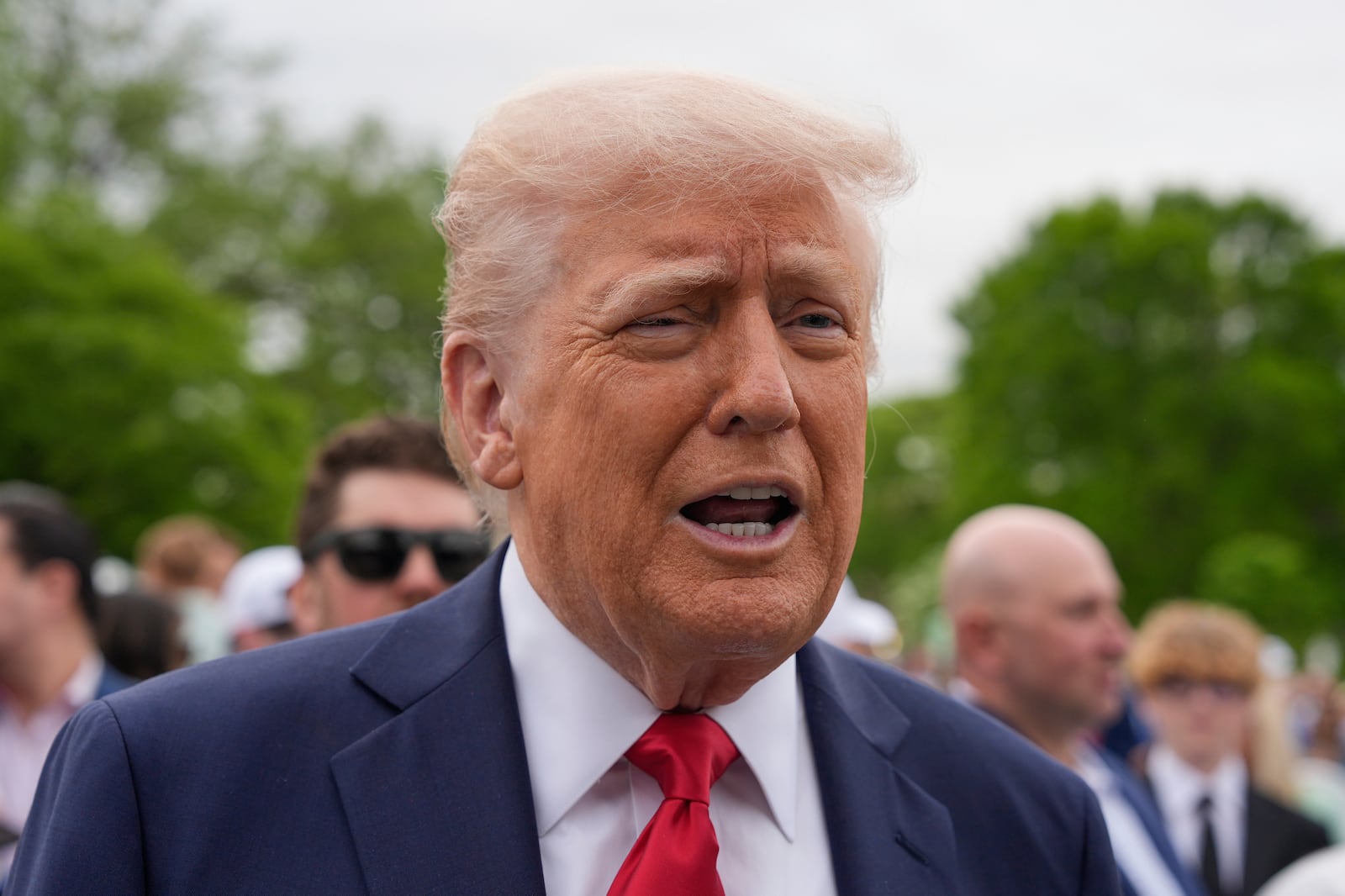President Donald Trump speaks to reporters during the White House Easter Egg Roll on the South Lawn of the White House, Monday, April 21, 2025, in Washington. (AP Photo/Alex Brandon)