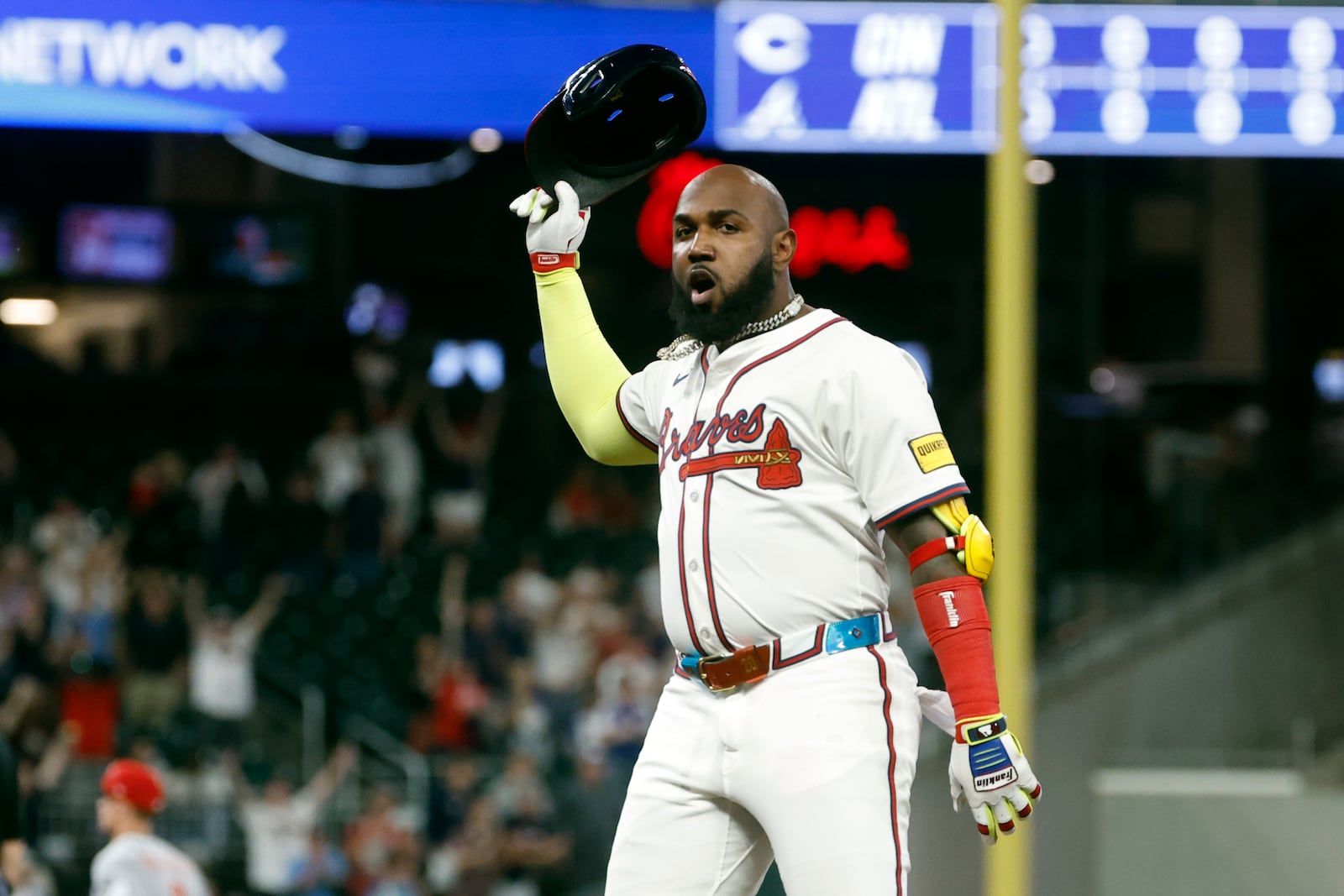 Atlanta Braves designated hitter Marcell Ozuna reacts after hitting a walk off RBI during the10th inning of a baseball game to beat the Cincinnati Reds, Tuesday, May 6, 2025, in Atlanta. (AP Photo/Butch Dill)