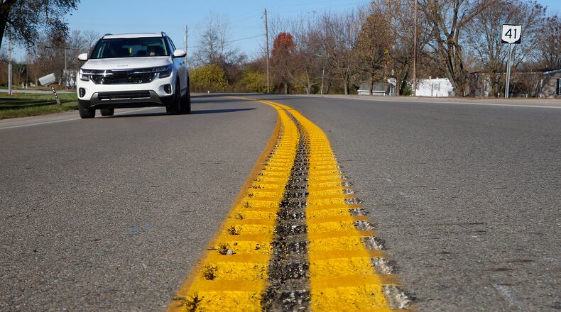 Rumble strips have been added to the center of Ohio Route 41 near where a fatal bus crash occurred earlier this year. BILL LACKEY/STAFF