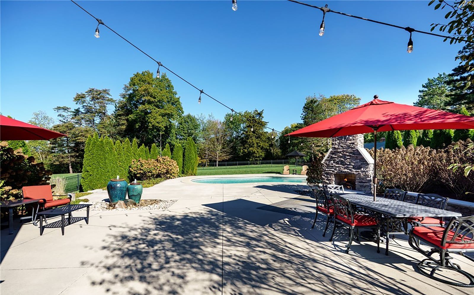 The home has a fiberglass salt water pool surrounded by an expanded patio. There are two water features and a woodburning outdoor stacked stone fireplace. CONTRIBUTED