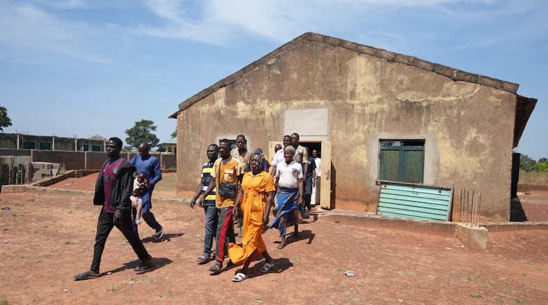 People who were kidnapped during a church service in November 2024 leave after a church meeting in Kaduna, northwestern Nigeria, Nov. 6, 2025.(AP Photo/Sunday Alamba)
