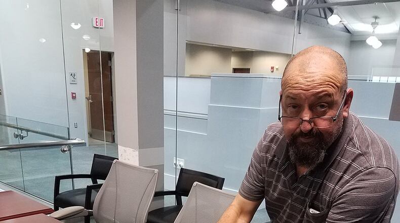 Mark Bernier, program manager for the Aircrew Mission Extender Device, also known as AMXDmax, points out sensors in the device, which are designed to detect moisture/urine, which is then pumped into a collection bag for disposal. AMXDmax can be used by aircrews for bladder relief in flight. (Contributed photo)
