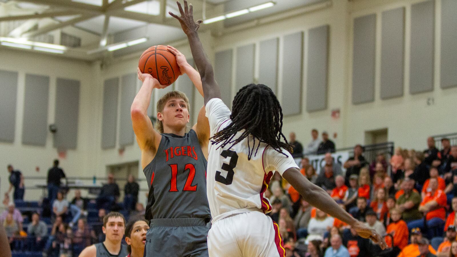 Jackson Center's Jace Mullenhour shoots against Patriot Prep's Keith Prysock during Tuesday night's Division IV region semifinal at Trent Arena. Mullenhour scored 31 points. CONTRIBUTED/Jeff Gilbert