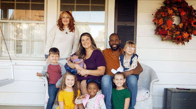 The Ivery family has adopted six children, including their youngest daughter, Hanaley. But Megan gave birth to Hanaley through embryo adoption. L-R Back Zoie; Middle: Braxton, Megan holding Hanaley, Shimar holding Makenzie Front: Lia, Janiyah and Sophia.