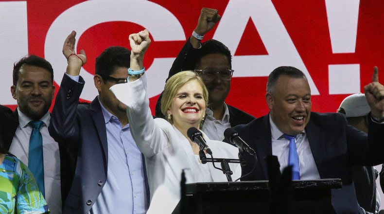 Presidential candidate Laura Fernández addresses supporters after polls closed in San Jose, Costa Rica, Sunday, Feb. 1, 2026. (AP Photo/Carlos Borbon)