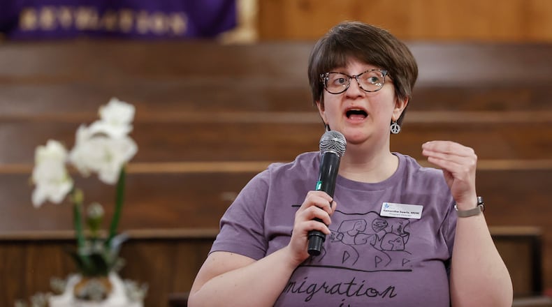Ignite Peace program director Samantha Searls speaks during a community safety meeting "Be a Neighbor: Building a Better Springfield For All," hosted by the Amos Project on Thursday, Jan. 29, 2026, at Zion Hill Baptist Church. Organizers gathered to share tools and guidance with expected ICE activity after the Temporary Protected Status expires on Tuesday, Feb. 3, 2026. JOSEPH COOKE / STAFF