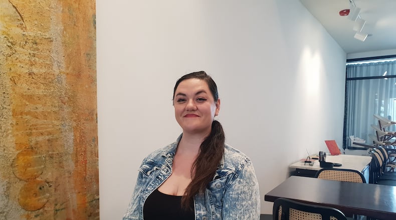 Lova Delis poses at Gather by Ghostlight in downtown Dayton. CONTRIBUTED