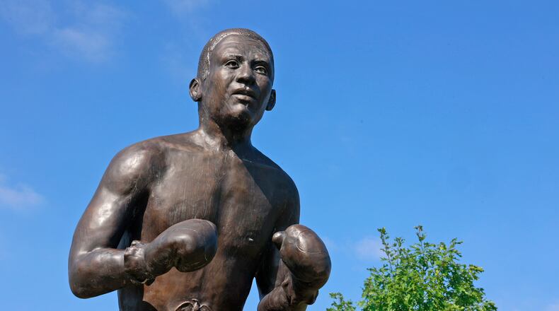 Boxing Champion Davey Moore statue along South Limestone Street in Springfield. BILL LACKEY/STAFF