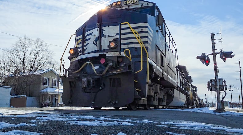 Hamilton to consider a quiet zone for the seven-crossing corridor through the center of town. Pictured is a CSX train traveling on Wednesday, Dec. 3, 2025, at the Maple Avenue train crossing. NICK GRAHAM/STAFF