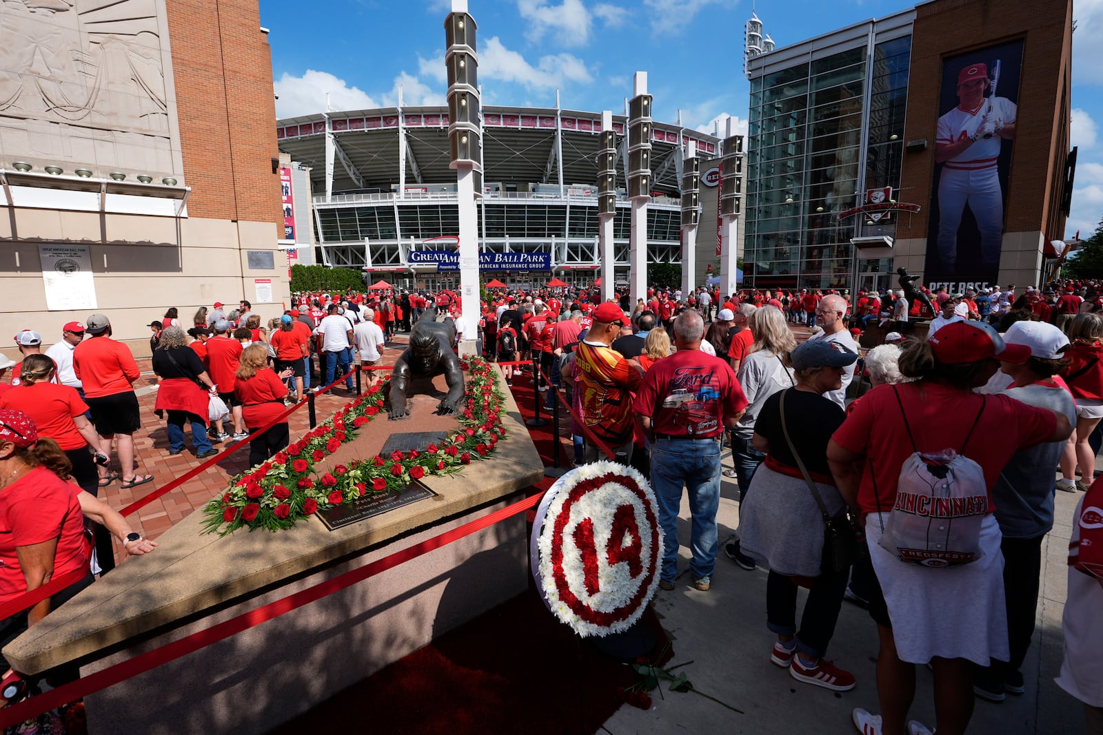 Fans line up to enter the ball park for Pete Rose Night events before a baseball game between the Cincinnati Reds and the Chicago White Sox, Wednesday, May 14, 2025, in Cincinnati. (AP Photo/Carolyn Kaster)