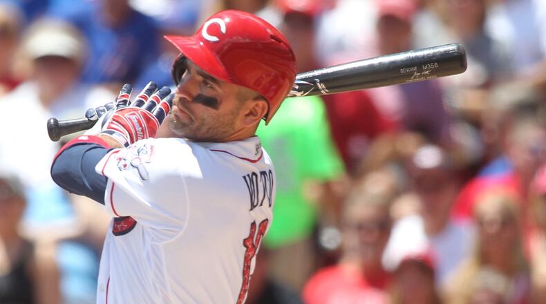 The Reds’ Joey Votto singles against the Cubs on Sunday, July 2, 2017, at Great American Ball Park in Cincinnati. David Jablonski/Staff
