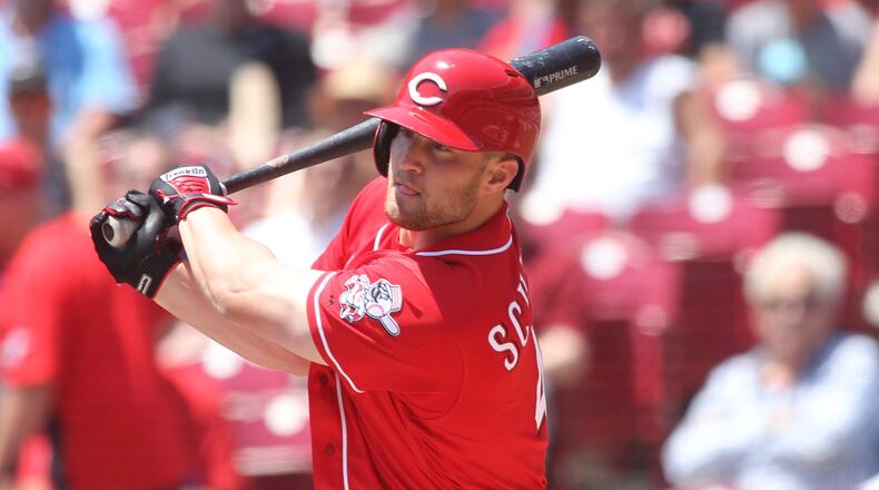 The Reds’ Scott Schebler swings against the Rockies on Thursday, June 7, 2018, at Great American Ball Park in Cincinnati. David Jablonski/Staff
