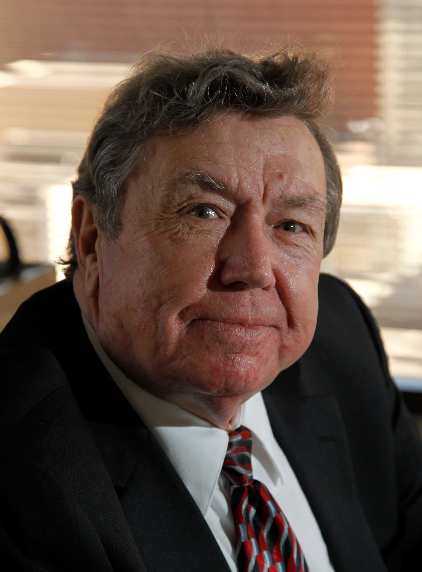 Bobby Joe Cox, a defense attorney in Dayton, will be inducted into Stivers' Athletic Hall of Fame Sunday. LISA POWELL / STAFF