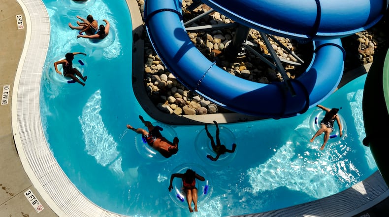 Swimmers at the Splash Zone Family Aquatic Center float along the "Lazy River" Monday, August 16 as they enjoy the final weeks of summer. Staff photo by Bill Lackey