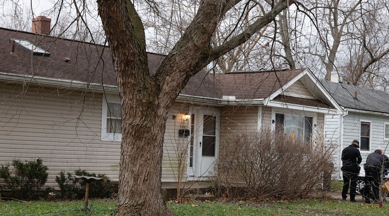 FBI agents searched a home in the 100 block of Pat Lane in Fairborn on Thursday, Dec. 16, 2021. JIM NOELKER / STAFF