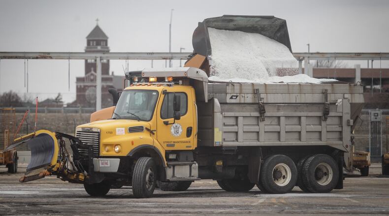 The Dayton salt barn was busy Thursday afternoon, Jan. 28, 2021, in preparation for a weekend snowstorm. JIM NOELKER/STAFF
