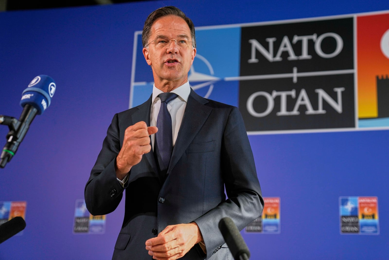 NATO Secretary General Mark Rutte talks to journalists as he arrives for a NATO's informal meeting of foreign ministers in Antalya, southern Turkey, Thursday, May 15, 2025. (AP Photo/Khalil Hamra)