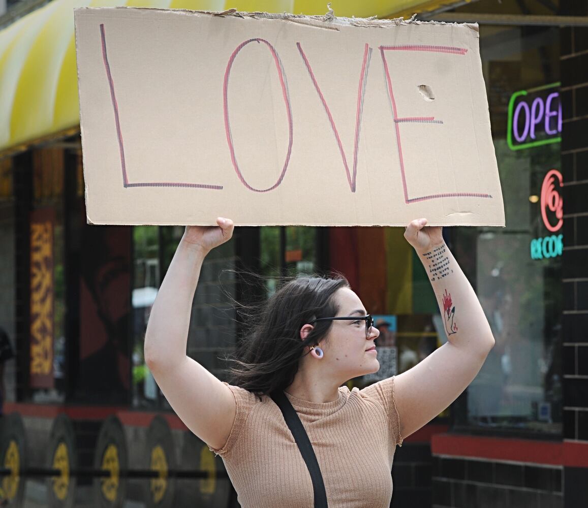 Protestors march through the Oregon District