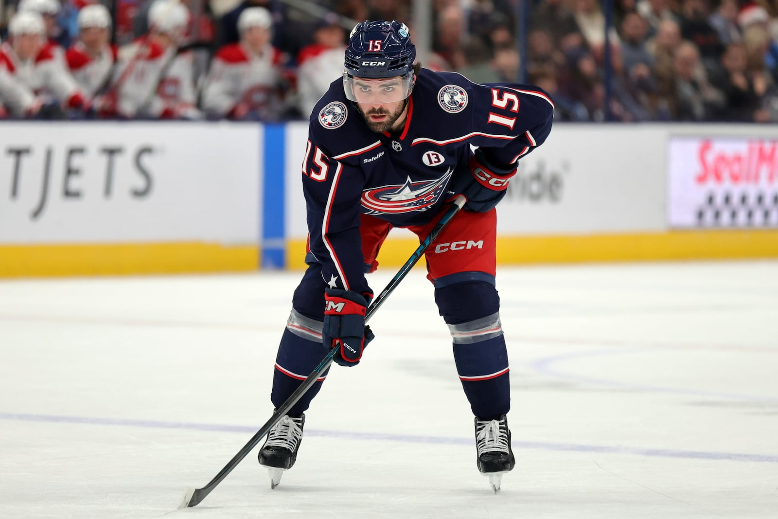 FILE - Columbus Blue Jackets defenseman Dante Fabbro waits on the puck drop against the Montreal Canadiens during an NHL hockey game in Columbus, Ohio, Dec. 23, 2024. (AP Photo/Paul Vernon, file)