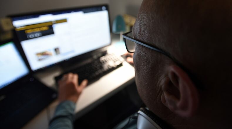 A Department of Defense civilian employee teleworks in early April 2020. DEPARTMENT OF DEFENSE PHOTO