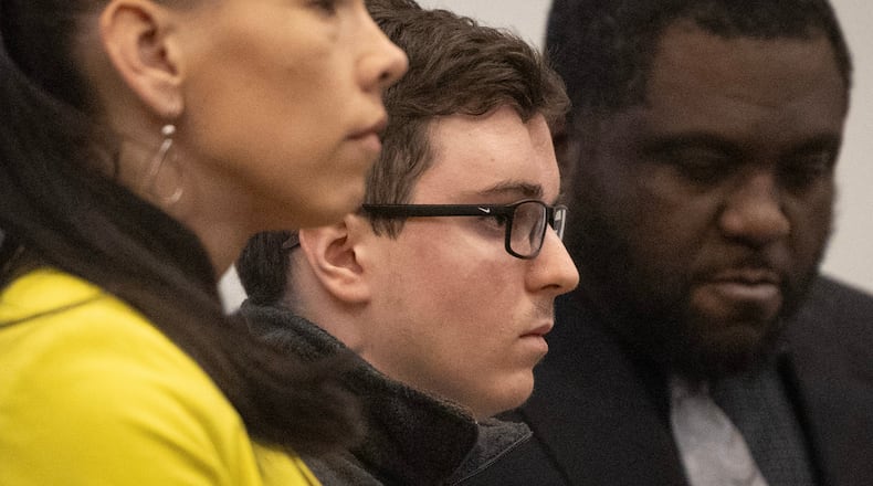 Austin Thompson, center, listens in court in Raleigh, N.C., on Friday, Feb. 13, 2026, as Wake County Superior Court Judge Paul C. Ridgeway sentences him to five life sentences without the possibility of parole. (Scott Sharpe/The News & Observer via AP, Pool)