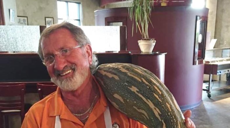 Franco Germano holding a squash — a very large squash — in the restaurant he founded in 1976 at the age of 31: Franco’s Ristorante Italiano, at 824 E. Fifth St. in Dayton. SUBMITTED